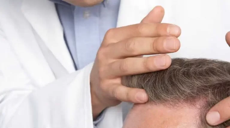 doctor touching client's hair